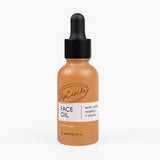 UpCircle Hydrating Face Oil in a sustainable glass dropper bottle resting on a textured travertine stone surface.
