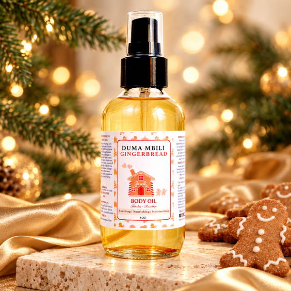 Duma Mbili Gingerbread Body Oil in a sleek glass apothecary bottle resting on a textured oatmeal linen background.