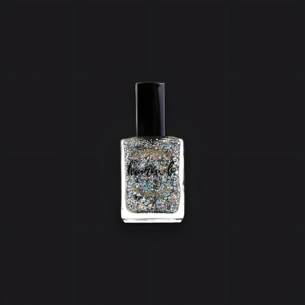 Lauren B. Beauty 33 Carats nail polish bottle with a sleek black cap, displayed on a textured beige stone surface.