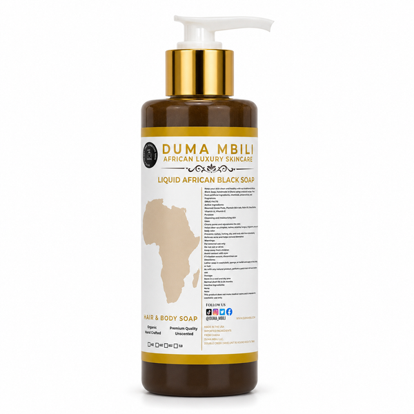 Duma Mbili Liquid African Black Soap in a minimalist amber glass apothecary bottle resting on a honed travertine plinth.