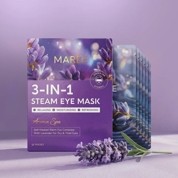Marée Scented Spa Steam Eye Mask in individual elegant sachet resting on a textured travertine plinth.