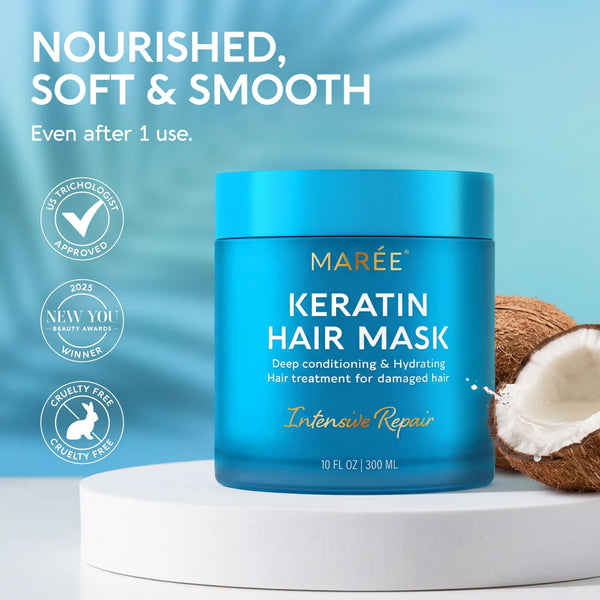 Marée Keratin Mask for Damaged Hair housed in a sleek, minimalist cream jar, set against a smooth beige stone backdrop.