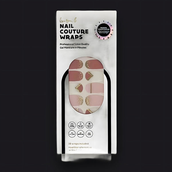 Lauren B. Beauty Color Change Pink & Gold geometric gel nail wraps displayed on a travertine surface with raw silk linen.