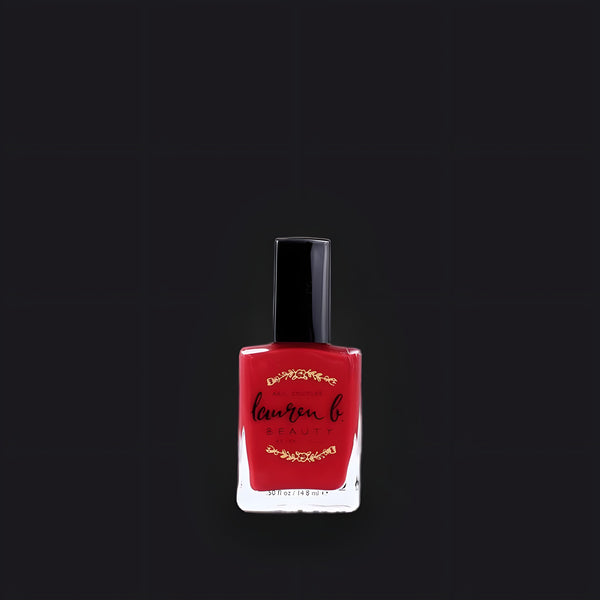 Lauren B. Beauty Rodeo Drive nail polish in a sleek, square glass bottle set against a textured oatmeal linen background.